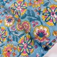 Blockprint Flower varius on light blue